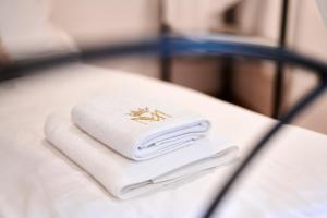 a towel with a spider on it sitting on a table at MM Apartments in Koper +56 photos