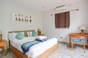 Ένα ή περισσότερα κρεβάτια σε δωμάτιο στο Prema Uja Villas +14 φωτογραφίες