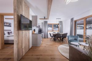 Televízia a/alebo spoločenská miestnosť v ubytovaní Apartment Streif LXL