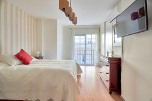 Posteľ alebo postele v izbe v ubytovaní Apartamento malagueta