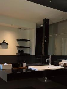 Koupelna v ubytování Cede Boutique Beach Resort