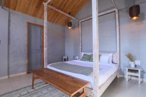 Postel nebo postele na pokoji v ubytování Seclude Pangot, Perch
