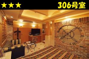TV a/nebo společenská místnost v ubytování HOTEL Us Bentenbashi Adult only