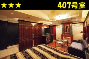 HOTEL Us Bentenbashi Adult onlyにあるベッド