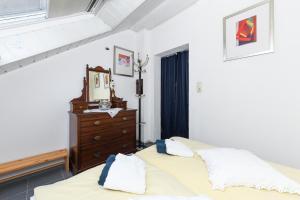 Ένα ή περισσότερα κρεβάτια σε δωμάτιο στο Ferienhaus Nordseekate