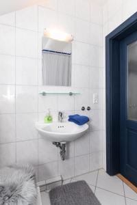 Ένα μπάνιο στο Ferienhaus Nordseekate +20 φωτογραφίες