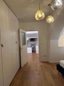 A kitchen or kitchenette at Ulivo Suites - apartments