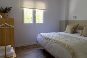 Posteľ alebo postele v izbe v ubytovaní Alojamientos Rurality Home