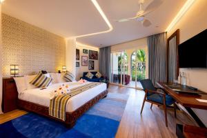 Llit o llits en una habitació de The Mora Zanzibar - Luxury All Inclusive