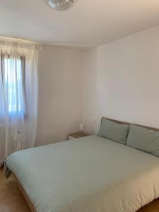 Postel nebo postele na pokoji v ubytování IL MESSINO