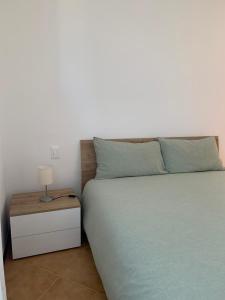 Postel nebo postele na pokoji v ubytování IL MESSINO