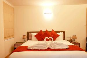 Postelja oz. postelje v sobi nastanitve Kuruva Island Resort And Spa - By KABINI BREEZE, Wayanad