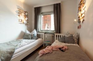 Postel nebo postele na pokoji v ubytování "Haus Luv" Haus Luv, Whg 2
