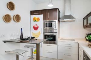 Kuchyň nebo kuchyňský kout v ubytování Apartamento Costa Esmeralda