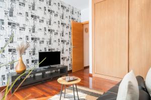 TV a/nebo společenská místnost v ubytování Apartamento Costa Esmeralda