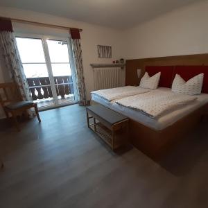 Postel nebo postele na pokoji v ubytování Ferienwohnungen Haus Martin