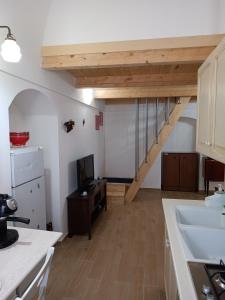 TV a/nebo společenská místnost v ubytování Nonno Nunzio House