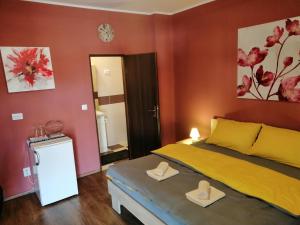 Tempat tidur dalam kamar di City Break Rooms Zagreb