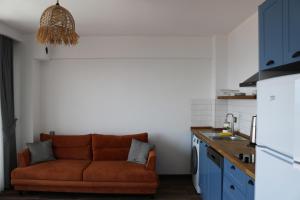 A kitchen or kitchenette at Assos Luna Houses