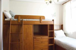 A bed or beds in a room at Apartamento CUNTIS