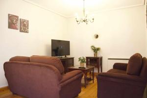 A television and/or entertainment centre at Apartamento CUNTIS
