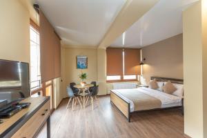 Postel nebo postele na pokoji v ubytování Pine Chalets by KA Group