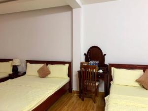 Posteľ alebo postele v izbe v ubytovaní NGỌC MẤY - ĐẠI LỢI HOTEL
