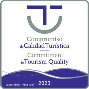 a logo for the committee called cubed tucson committee commitment to tourism quality at MD Design Hotel - Portal del Real in Valencia