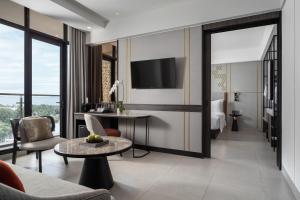 TV a/nebo společenská místnost v ubytování Hotel Santika Premiere Padang