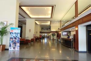 an empty lobby of a hospital with a waiting room at Omni Tower Sukhumvit Nana by Direct Rooms in Bangkok