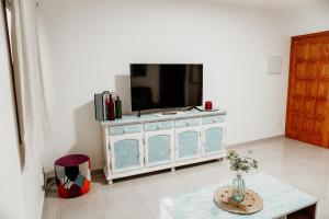 A television and/or entertainment centre at Casa Las Costas, Las Maretas