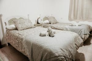 A bed or beds in a room at Casa Las Costas, Las Maretas