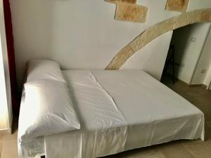 A bed or beds in a room at Il sottano alla strada Polignano a mare