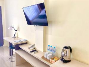 Príslušenstvo na prípravu kávy alebo čaju v ubytovaní Albero Hotel Bogor