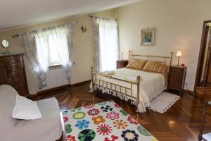 A bed or beds in a room at Patrian