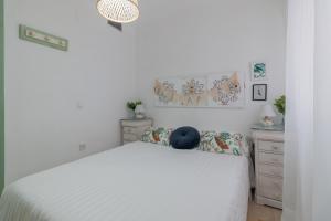 Posteľ alebo postele v izbe v ubytovaní Apartamento Centrico Isaura