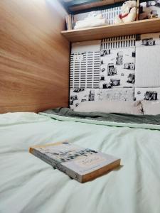 Postel nebo postele na pokoji v ubytování Auntie Liên's Homestay
