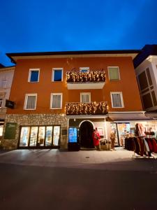 a building with a store in front of it at Apartment Katrin im Zentrum in Bad Ischl