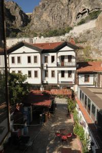 an overhead view of a building with a table and chairs at SALİH BEY KONAĞI in Amasya