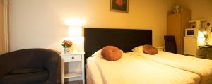 Postel nebo postele na pokoji v ubytování Euroway Hotel