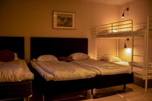 Postel nebo postele na pokoji v ubytování Euroway Hotel