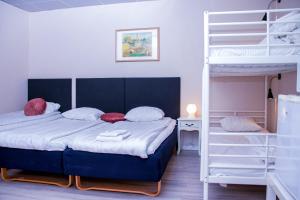 Postel nebo postele na pokoji v ubytování Euroway Hotel
