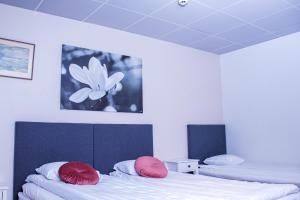 Postel nebo postele na pokoji v ubytování Euroway Hotel