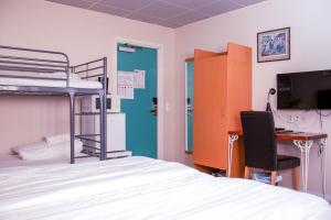 Postel nebo postele na pokoji v ubytování Euroway Hotel