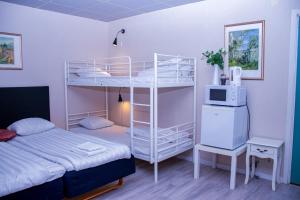 Postel nebo postele na pokoji v ubytování Euroway Hotel