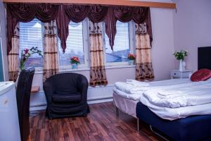 Postel nebo postele na pokoji v ubytování Euroway Hotel