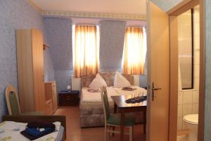 Postel nebo postele na pokoji v ubytování Hotel Sessellift