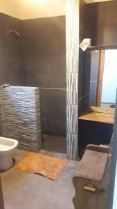 Ένα μπάνιο στο Casa Villa General Belgrano +25 φωτογραφίες