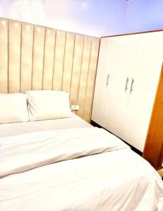 Voodi või voodid majutusasutuse 1-bedroom apartment at Asokoro by ECOWAS toas