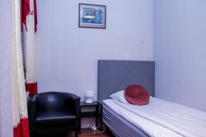 Postel nebo postele na pokoji v ubytování Euroway Hotel